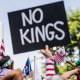 Protestors march during an anti-Trump "No Kings Day" demonstration.
