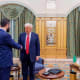 Ahmed al-Sharra meets with Donald Trump.