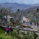 Residents on walk through after the aftermath of Hurricane Melissa on Oct. 29, 2025 in Lacovia Tombstone, Jamaica.