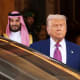 U.S. President Donald J. Trump leaves the Saudi Royal Court with Saudi Crown Prince Mohammed bin Salman.