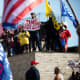 Demonstrators hold signs at a pro-Trump protest during the 2020 Presidential election in Detroit.