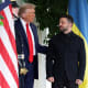 U.S. President Donald Trump greets Ukrainian President Volodymyr Zelensky at the White House.