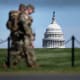 Members of the National Guard patrol the National Mall.
