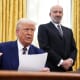 U.S. President Donald Trump and Secretary of Commerce Howard Lutnick in the Oval Office at the White House.