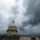 Storm clouds hover over the U.S. Capitol.