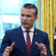 U.S. Defense Secretary Pete Hegseth and U.S. President Donald Trump in the Oval Office of the White House.