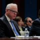 Tim Walz listens during a hearing with the House Oversight and Accountability Committee at the U.S. Capitol.