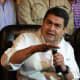 Then Honduran President Juan Orlando Hernandez delivers a press conference after handing a referendum request to the president of the Honduran Congress Mauricio Oliva (out of frame) in Tegucigalpa on Jan. 24, 2015.
