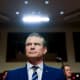 A light shines above Pete Hegseth, US secretary of defense, during a Senate Armed Services Committee hearing in Washington, D.C.