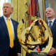 President Donald Trump speaks alongside FIFA President Gianni Infantino after unveiling the 2025 Club World Cup trophy in the Oval Office on March 7, 2025.
