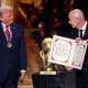 President of FIFA Gianni Infantino, right, presents President Donald Trump with the FIFA Peace Prize during the FIFA World Cup 2026 Official Draw at John F. Kennedy Center for the Performing Arts in Washington, D.C.