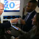 U.S. President Donald Trump speaks to reporters aboard Air Force One.