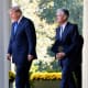 Donald Trump and Jerome Powell on in the Rose Garden of the White House.