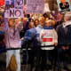 Demonstrators protest at the Indiana Statehouse in Indianapolis, I.N., on Dec. 8, 2025.