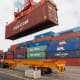 Cranes unload shipping containers at the Port of Los Angeles.