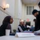 Job seekers attend a career fair in Harlem hosted.