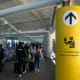 Passengers walk through the terminal toward U.S. Customs and Border Protection at New Jersey's Newark Liberty International Airport on Nov. 3, 2024.