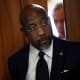 U.S. Sen. Raphael Warnock leaves a Senate Democratic meeting on Oct. 3, 2025 at the U.S. Capitol Building.