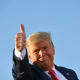President Donald Trump gives a thumbs up as he leaves a rally in Tucson, A.Z.