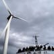 Guests tour one of the turbines of the United States’ first offshore wind farms off the coast of Block Island, R.I., on Oct. 17, 2022.