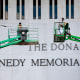 Workers adjust the name of the “John F. Kennedy Memorial Center for the Performing Arts" on Dec. 19, 2025, in Washington, D.C.