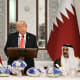 President Donald Trump and Qatar's Emir Sheikh Tamim bin Hamad al-Thani at a state dinner at the Lusail Palace in Doha, Qatar.