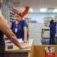 Two pharmacists at work at a CVS Pharmacy.