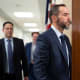 Former Department of Justice Special Counsel Jack Smith enters a room.