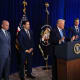 Homeland Security Advisor Stephen Miller, Secretary of State Marco Rubio, Secretary of War Pete Hegseth and Chairman of the Joint Chiefs of Staff Dan Caine listen as U.S. President Donald Trump addresses the media during a news conference at his Mar-a-Lago club on January 03, 2026, in Palm Beach, Florida.