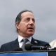 Jamie Raskin speaks at a podium in front of the US Capitol.