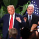 U.S. President Donald Trump dances as House Majority Whip Tom Emmer applauds on Jan. 27, 2025 in Doral, FL.