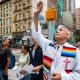 Members of the New Sanctuary Coalition (NSC) participate in a weekly prayer outside of immigration court at the Jacob K. Javits Federal Building on July 10, 2025, in New York City.