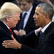 Donald Trump, left, and Barack Obama shake hands and touch each other on the shoulder.