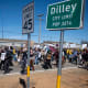 DILLEY, TEXAS - JANUARY 28: People protest against Immigration and Customs Enforcement as they march toward the South Texas Family Residential Center on January 28, 2026 in Dilley, Texas. A federal judge temporarily blocked the deportation of 5-year-old Liam Conejo Ramos and his father, Adrian Conejo Arias, who were arrested in Minneapolis after the father had picked the boy up from school. They were then taken to the South Texas Family Residential Center, an immigration detention center outside San Antonio, where they remain. (Photo by Joel Angel Juarez/Getty Images)