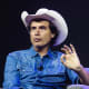 Kimbal Musk sits at the stage.