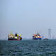 Commercial vessels are pictured offshore in Dubai.