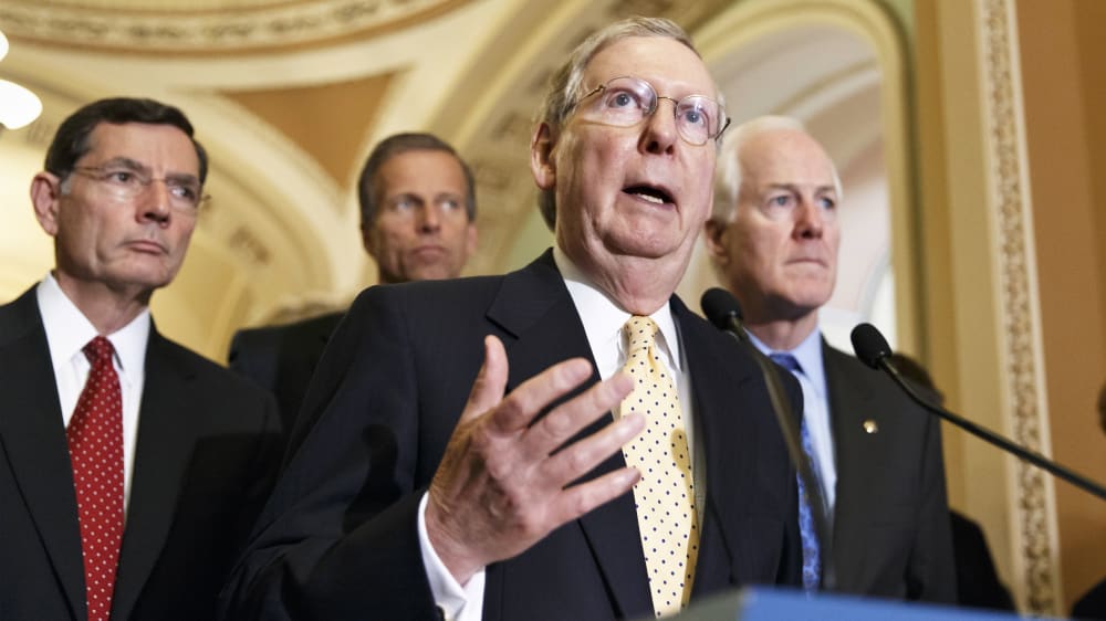 Senate Minority Leader Mitch McConnell speaks to reporters, June 10, 2014.