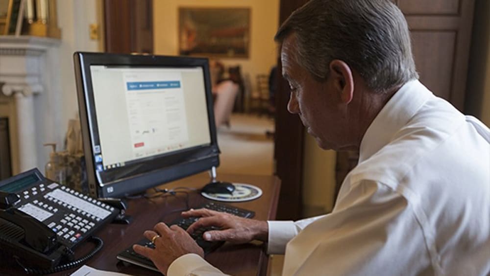House Speaker John Boehner attempts to sign up for healthcare on the DC Health Link in Washington, November 21, 2013. Boehner said on his blog that he was successfully enrolled after help from the DC Health Link help line.