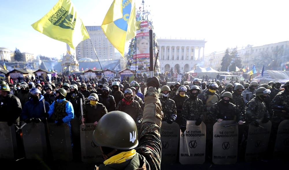 Anti-government Protesters gather at the Independence Square after demonstrating around the national Stadium on Feb. 6, 2014 in Kiev, Ukraine.
