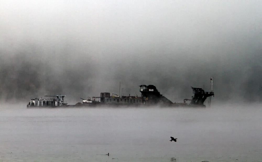 A ship on a foggy morning.
