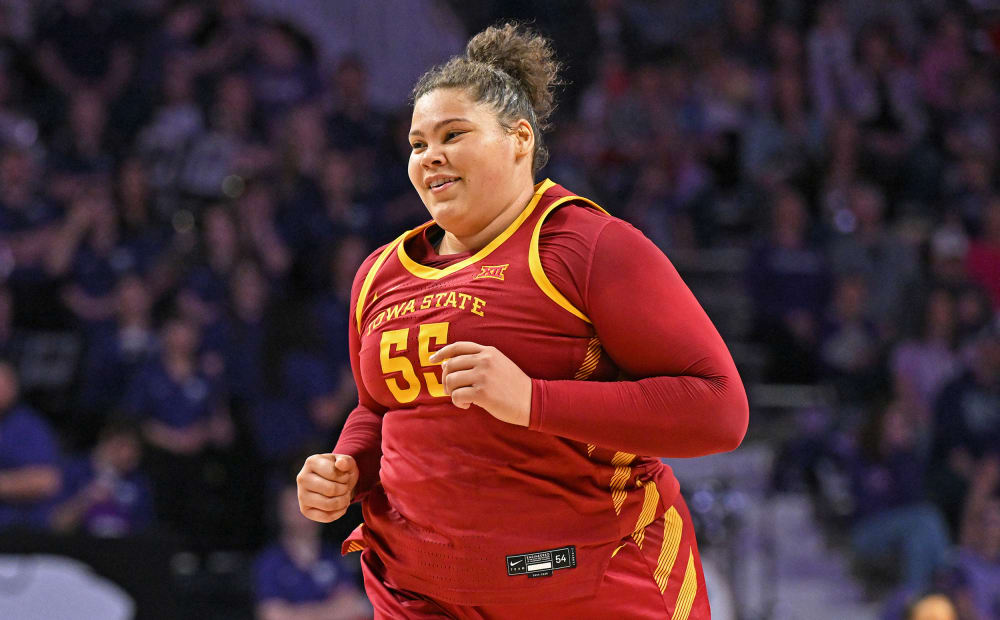 Audi Crooks #55 of the Iowa State Cyclones runs down court.