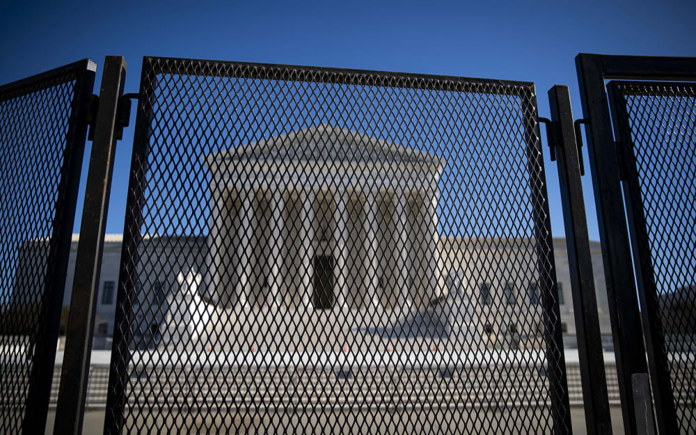 Protective fencing is erected around the U.S. Supreme Court on Jan. 10, 2021.