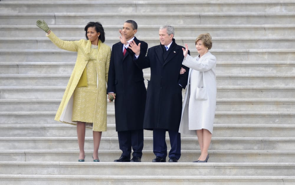 Left - right: Michelle Obama, President Barack Obama, Former President George W. Bush and Laura Bush wave as former Vice President Dick Cheney departs on the East Front of the Capitol after Obama was sworn in as the 44th President of the United States...