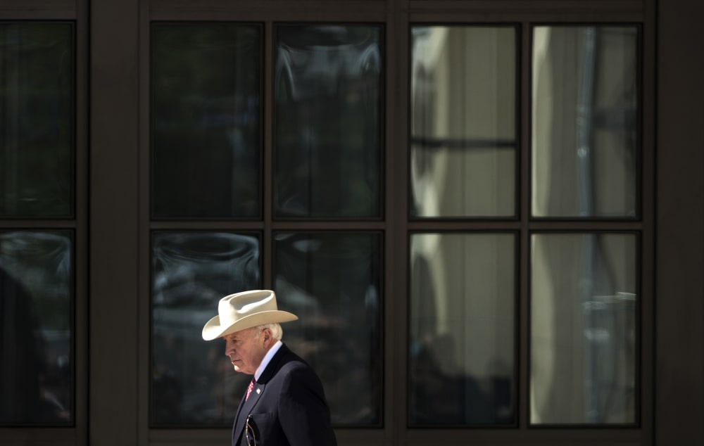 Former US Vice President Dick Cheney arrives for a dedication ceremony at the George W. Bush Library and Museum