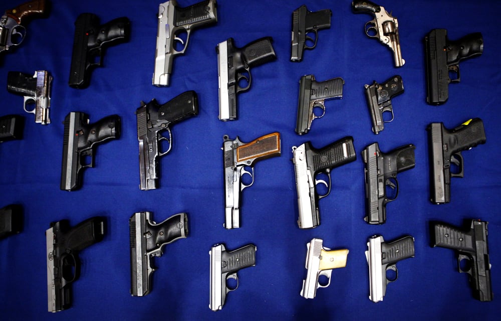 Image: Seized handguns in New York in 2013.