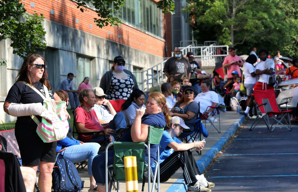 Image: People Wait In Line To File For Unemployment Benefits In Frankfort, Kentucky