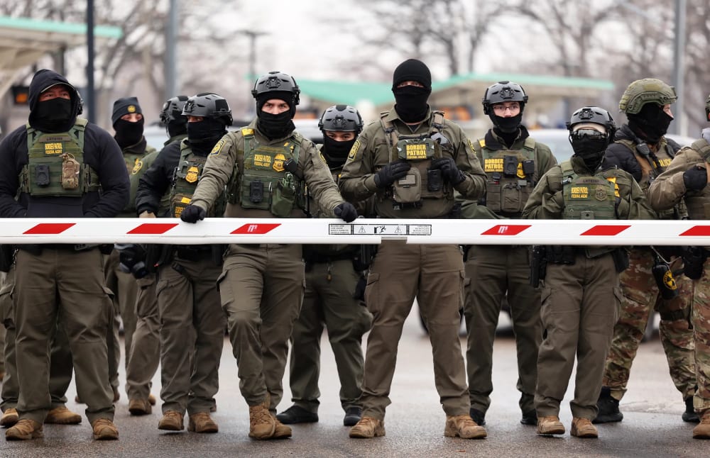 US Border Patrol agents stand guard on Jan. 8, 2026 in Minneapolis.