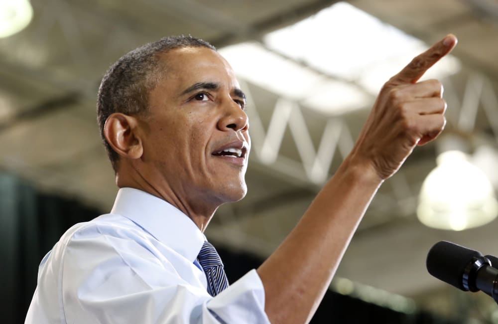 U.S. President Barack Obama delivers remarks on the economy at Costco Wholesale in Woodmore Towne Centre in Lanham, Maryland January 29, 2014.