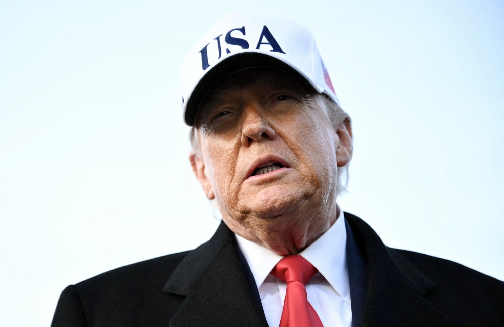 President Donald Trump speaks to the press.