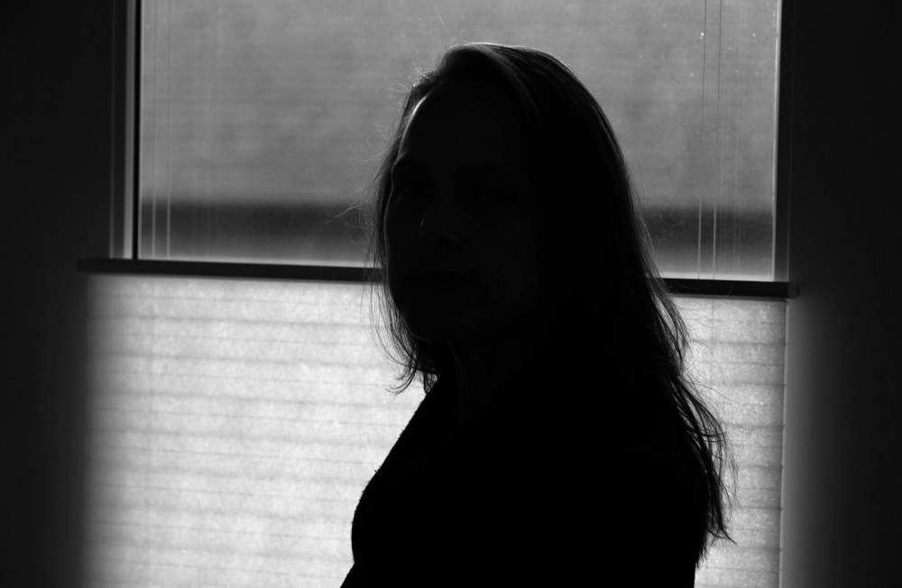 Image: A former FBI analyst, who asked to be identified only as Becky, on Dec. 9, 2020. Becky alleged that a FBI supervisory special agent licked her face and groped her at a colleague's farewell party in 2017 and was subsequently diagnosed with post-trau